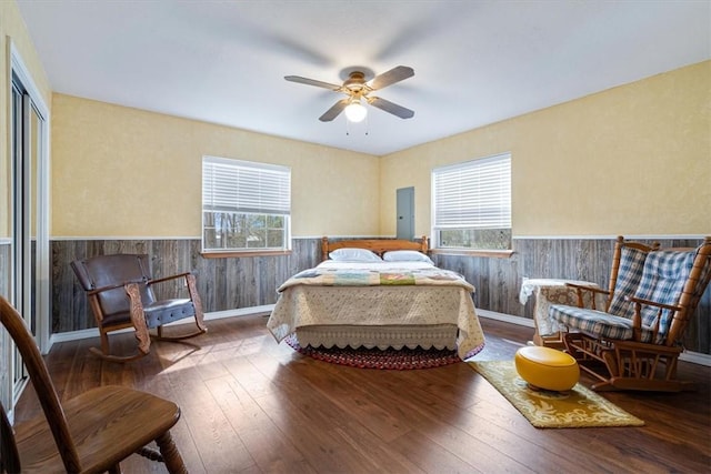 14745 Russell Rd, Siloam Springs, AR 72761 - bedroom with multiple windows, hardwood / wood-style floors, and a wainscoted wall