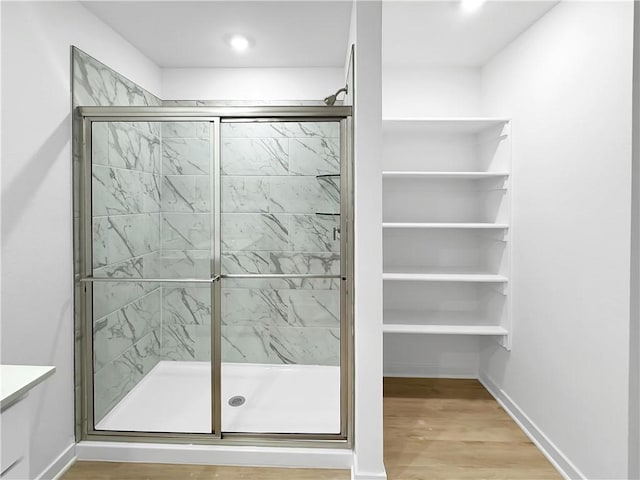 575 W Canada Dr, Farmington, AR 72730 - full bath with recessed lighting, baseboards, a shower stall, and wood finished floors