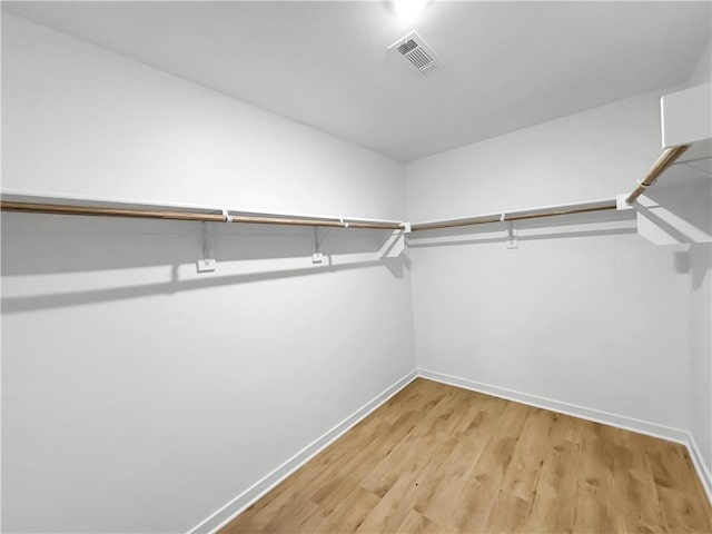 575 W Canada Dr, Farmington, AR 72730 - spacious closet with visible vents and light wood finished floors
