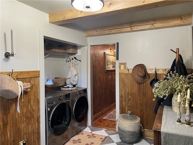 laundry room with washer and clothes dryer and laundry area