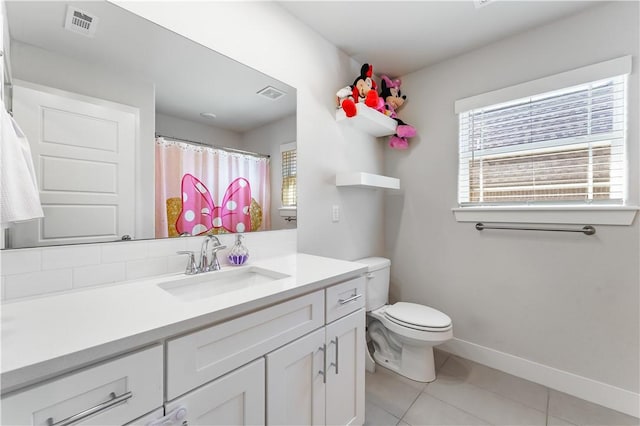 2208 N Carl St, Siloam Springs, AR 72761 - bathroom featuring visible vents, toilet, tile patterned flooring, and vanity