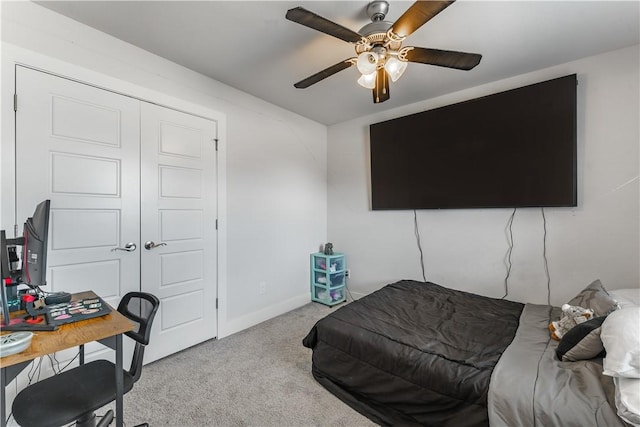 2208 N Carl St, Siloam Springs, AR 72761 - bedroom with baseboards, ceiling fan, and carpet