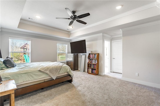 2208 N Carl St, Siloam Springs, AR 72761 - carpeted bedroom with visible vents, crown molding, a tray ceiling, and multiple windows