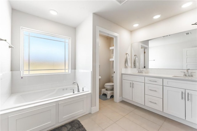 2208 N Carl St, Siloam Springs, AR 72761 - bathroom featuring visible vents, toilet, a garden tub, and a sink