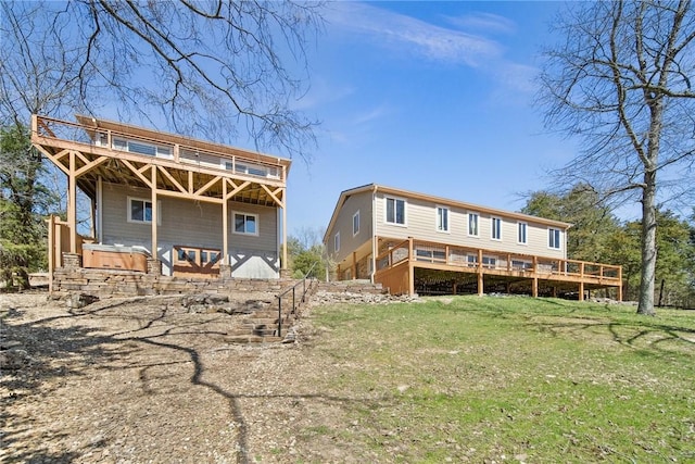 21621 Vista Shores Dr, Garfield, AR 72732 - rear view of property featuring a deck, a yard, and a hot tub