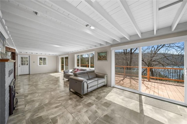 21621 Vista Shores Dr, Garfield, AR 72732 - living area featuring beam ceiling and a fireplace