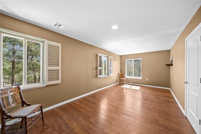 21621 Vista Shores Dr, Garfield, AR 72732 - empty room featuring recessed lighting, visible vents, baseboards, and wood finished floors