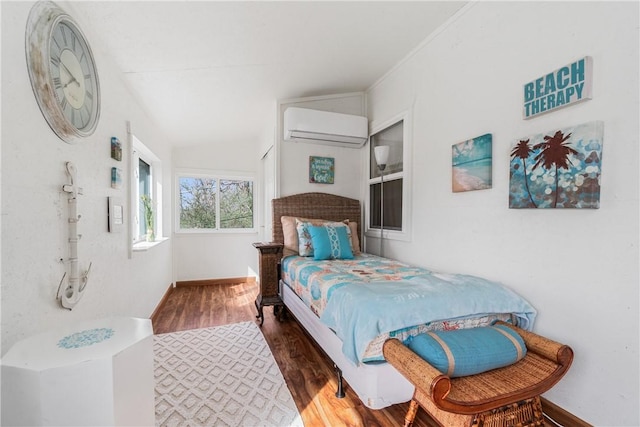 10230 S Marango Dr, Rogers, AR 72758 - bedroom with a wall mounted AC, wood finished floors, and baseboards