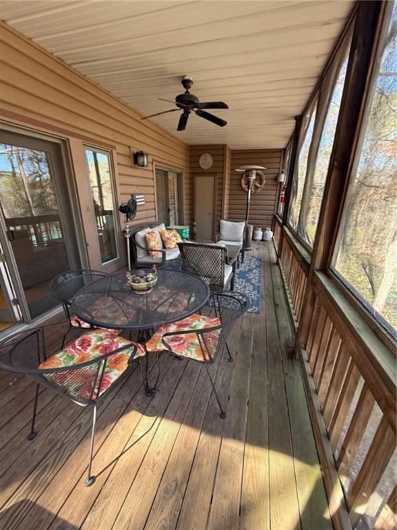258B Vista, Mount Ida, AR 71957 - sunroom / solarium featuring outdoor dining space and ceiling fan
