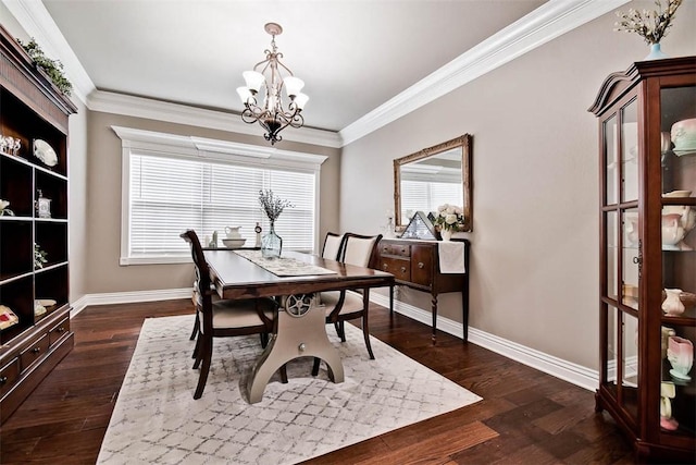 dining area featuring baseboards, an inviting chandelier, crown molding, and dark wood finished floors