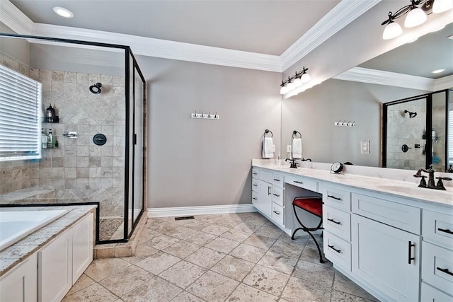 full bathroom featuring a sink, crown molding, a stall shower, and baseboards