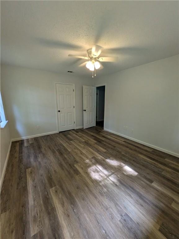 116 Stegall Rd, Clarksville, AR 72830 - unfurnished room with a ceiling fan and dark wood-style floors