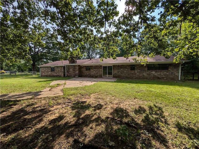 116 Stegall Rd, Clarksville, AR 72830 - rear view of house featuring brick siding and a patio area