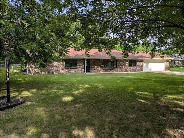 116 Stegall Rd, Clarksville, AR 72830 - view of front of home featuring a garage, brick siding, and driveway