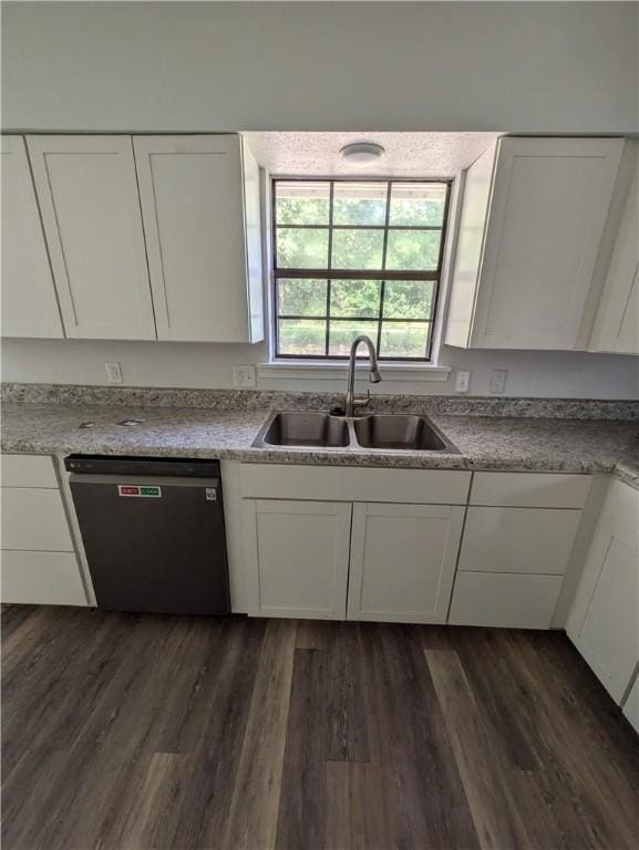 116 Stegall Rd, Clarksville, AR 72830 - kitchen with dishwasher, white cabinetry, dark wood-style flooring, and light countertops