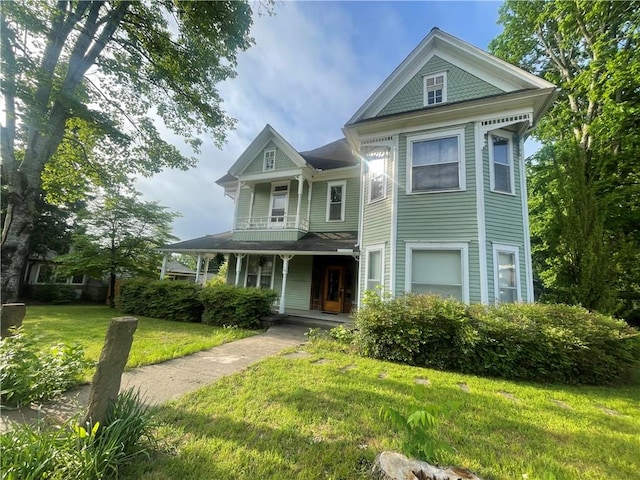 803 W Main St, Clarksville, AR 72830 - victorian-style house with a porch and a front yard