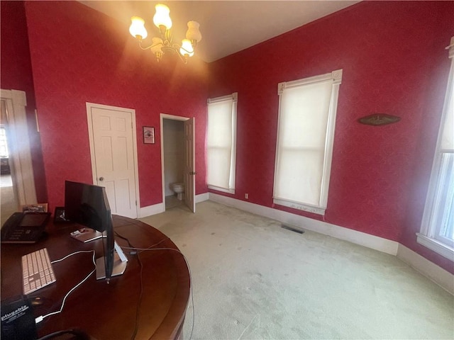 803 W Main St, Clarksville, AR 72830 - unfurnished office featuring a chandelier, light carpet, and baseboards