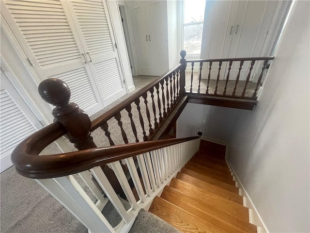 803 W Main St, Clarksville, AR 72830 - staircase with baseboards and wood finished floors