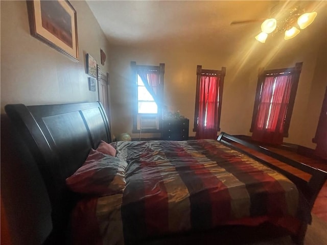803 W Main St, Clarksville, AR 72830 - bedroom featuring wood finished floors