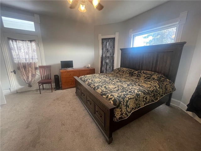 803 W Main St, Clarksville, AR 72830 - bedroom with light carpet and ceiling fan