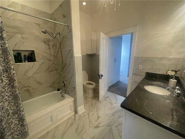 803 W Main St, Clarksville, AR 72830 - bathroom with shower / bath combo with shower curtain, marble finish floors, toilet, double vanity, and tile walls