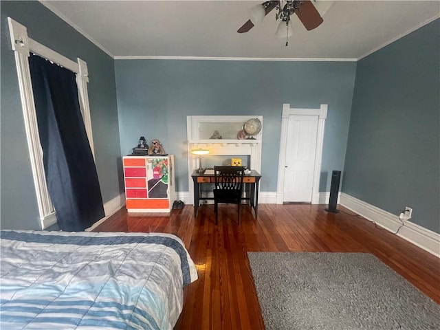803 W Main St, Clarksville, AR 72830 - bedroom with ornamental molding, wood finished floors, baseboards, and a desk