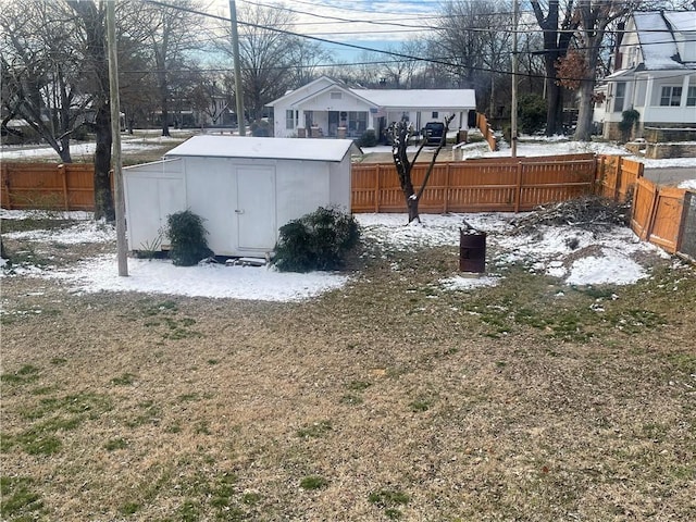 803 W Main St, Clarksville, AR 72830 - yard layered in snow featuring a fenced backyard