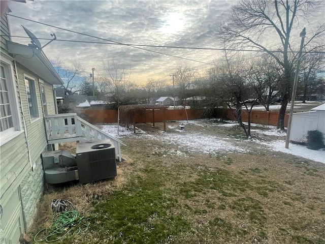 803 W Main St, Clarksville, AR 72830 - yard covered in snow with central AC and a fenced backyard