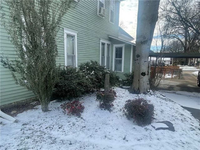 803 W Main St, Clarksville, AR 72830 - view of snow covered exterior with cooling unit