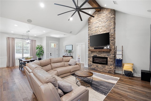 251 Kordsmeier Ln, Morrilton, AR 72110 - living area with a ceiling fan, hardwood / wood-style floors, beamed ceiling, a stone fireplace, and recessed lighting