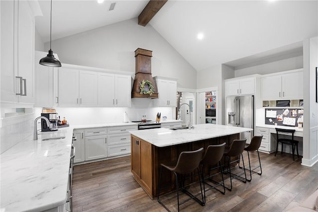 251 Kordsmeier Ln, Morrilton, AR 72110 - kitchen featuring high vaulted ceiling, a sink, custom range hood, stainless steel appliances, and beamed ceiling