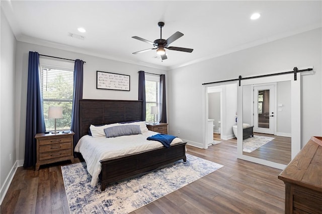 251 Kordsmeier Ln, Morrilton, AR 72110 - bedroom with a barn door, multiple windows, baseboards, crown molding, and recessed lighting
