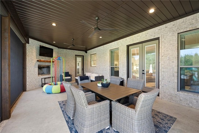 251 Kordsmeier Ln, Morrilton, AR 72110 - view of patio / terrace with a fireplace, ceiling fan, and french doors