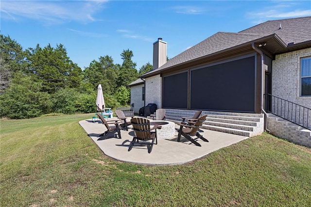 251 Kordsmeier Ln, Morrilton, AR 72110 - view of green lawn featuring a patio area, entry steps, and a fire pit