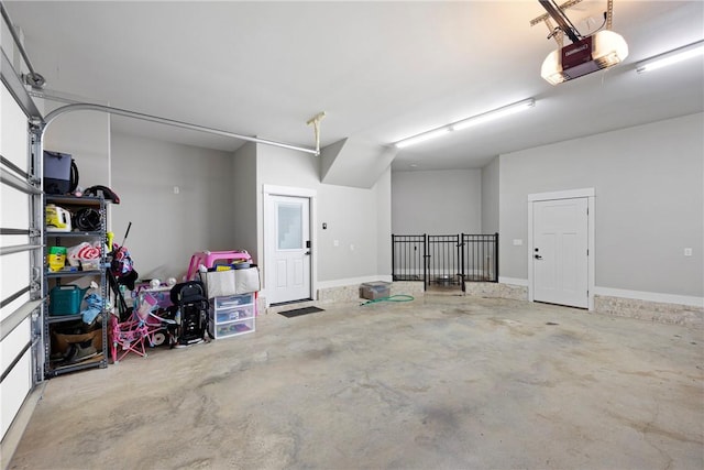 251 Kordsmeier Ln, Morrilton, AR 72110 - garage featuring a garage door opener