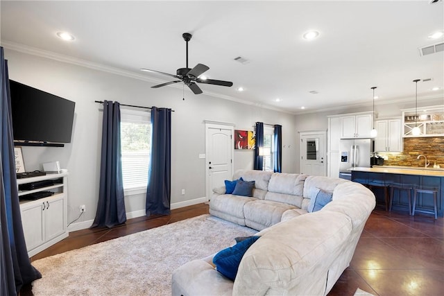 251 Kordsmeier Ln, Morrilton, AR 72110 - living room featuring ornamental molding, a ceiling fan, recessed lighting, dark tile patterned floors, and baseboards