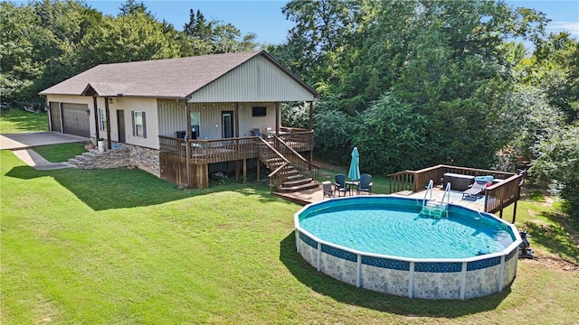 251 Kordsmeier Ln, Morrilton, AR 72110 - outdoor pool featuring stairs, a lawn, and a deck