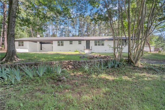 922 Scenic Dr, Perryville, AR 72126 - view of front of home featuring a front lawn and stucco siding