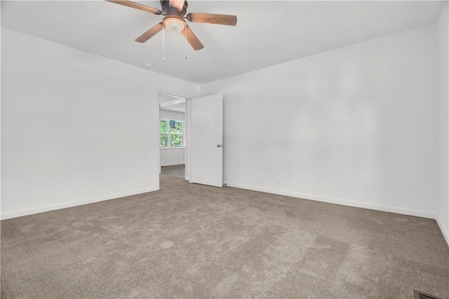922 Scenic Dr, Perryville, AR 72126 - spare room with carpet floors, ceiling fan, and baseboards