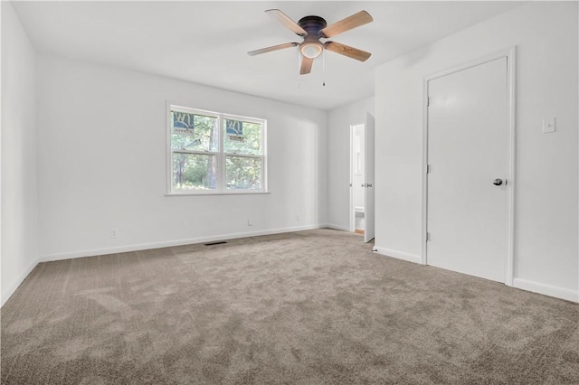 922 Scenic Dr, Perryville, AR 72126 - unfurnished bedroom with carpet flooring, baseboards, and ceiling fan