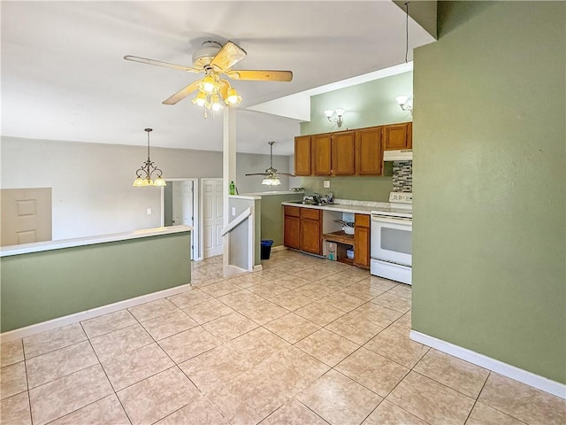 206 Arkansas St, Danville, AR 72833 - kitchen featuring white electric stove, under cabinet range hood, brown cabinetry, ceiling fan, and light countertops