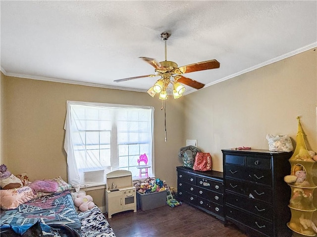 206 Arkansas St, Danville, AR 72833 - bedroom featuring dark wood finished floors, ornamental molding, a ceiling fan, and a textured ceiling