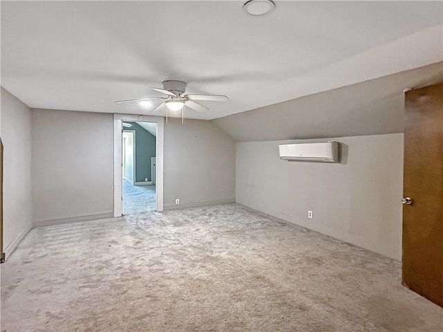 206 Arkansas St, Danville, AR 72833 - additional living space featuring a wall unit AC, a ceiling fan, carpet, lofted ceiling, and baseboards