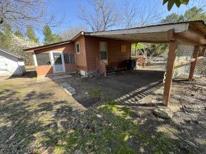 281 Blackwell Rd, Atkins, AR 72823 - view of home's exterior with an attached carport