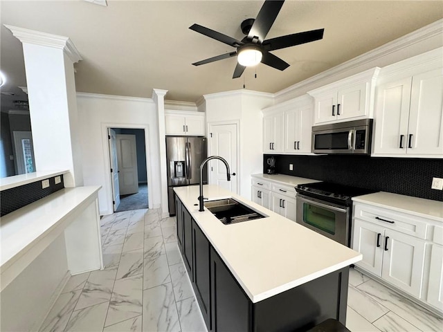 335 Point W, Conway, AR 72034 - kitchen with white cabinets, a sink, marble finish floor, ceiling fan, and appliances with stainless steel finishes