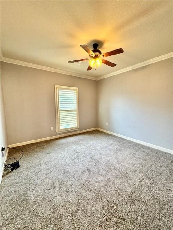 335 Point W, Conway, AR 72034 - spare room featuring a ceiling fan, baseboards, carpet, and crown molding