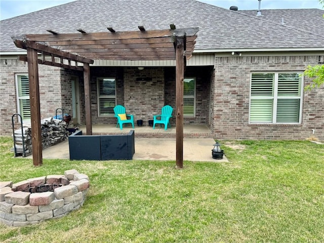 335 Point W, Conway, AR 72034 - rear view of house featuring a lawn, brick siding, a patio, and a shingled roof