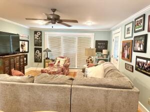 2816 Honeysuckle Ln, Russellville, AR 72801 - living area with ornamental molding, baseboards, and ceiling fan