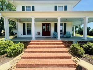 2816 Honeysuckle Ln, Russellville, AR 72801 - entrance to property featuring a porch