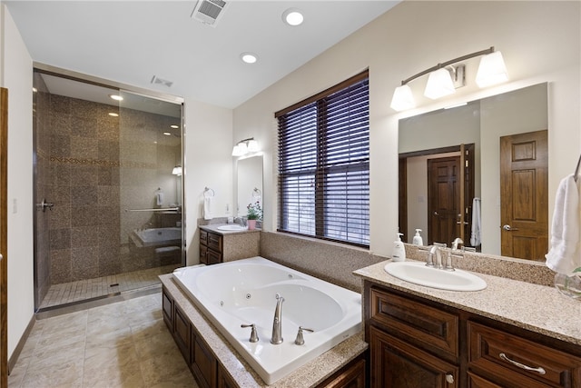 279 Eagle Cove Rd, Lamar, AR 72846 - full bath with a shower stall, a whirlpool tub, two vanities, and recessed lighting